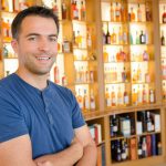 Portrait of man in alcohol store